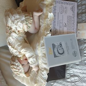 Ashton Drake porcelain baby doll.